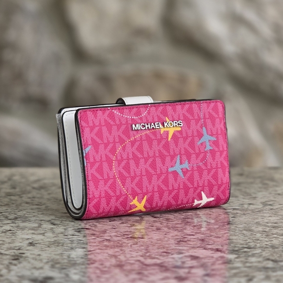 Michael Kors Medium Bifold Pink Airplane Wallet - Picture 1 of 6